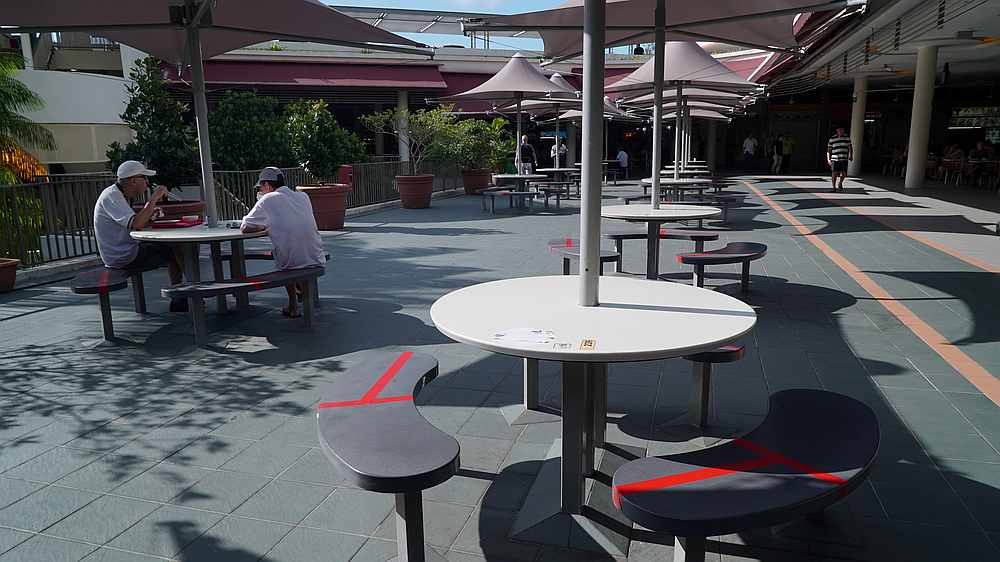 Seats are taped up to encourage social distancing, due to the outbreak of Covid-19, at a food centre in Singapore March 25, 2020. u00e2u20acu201d Reuters pic
