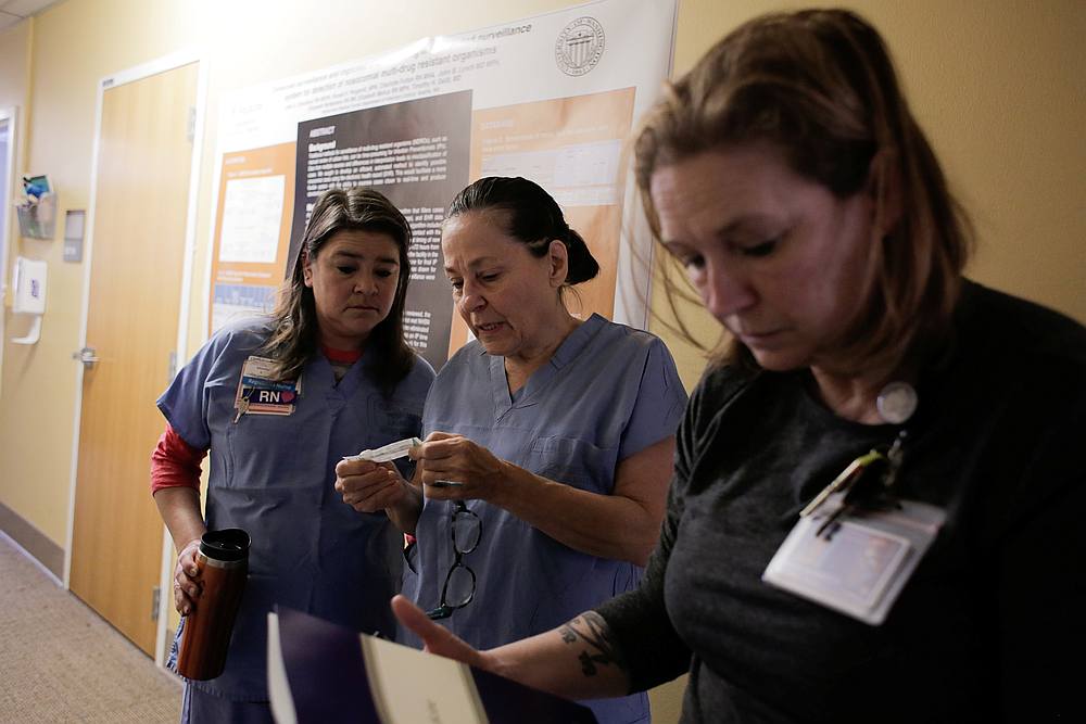 Harborview Medical Center's home assessment team, including (from left) Michelle Steik, Lucy Greenfield, and Krista Reitberg prepare to visit the home in Seattle, Washington February 29, 2020. u00e2u20acu201d Reuters pic