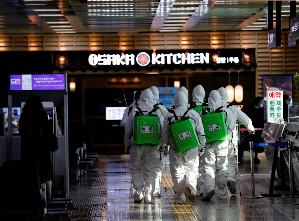 South Korean soldiers are mobilised for disinfection work, at the international airport amid the rise in confirmed cases of Covid-19 disease in Daegu, South Korea, March 6, 2020. u00e2u20acu201d Reuters pic 