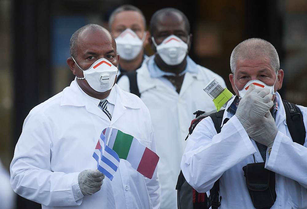 An emergency contingent of Cuban doctors and nurses arrive at Italy's Malpensa airport to help Italy battle the spread of Covid-19, near Milan March 22, 2020. u00e2u20acu201d Reuters pic