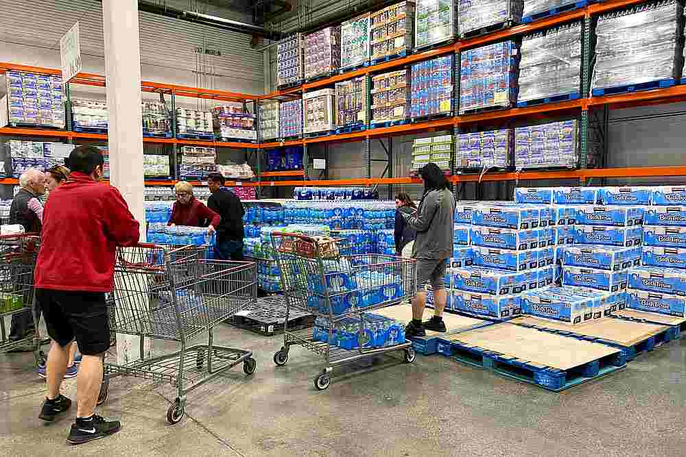 Customers load shopping carts with toilet paper and water at a Costco store in Carlsbad, California March 2, 2020. u00e2u20acu201d Reuters pic