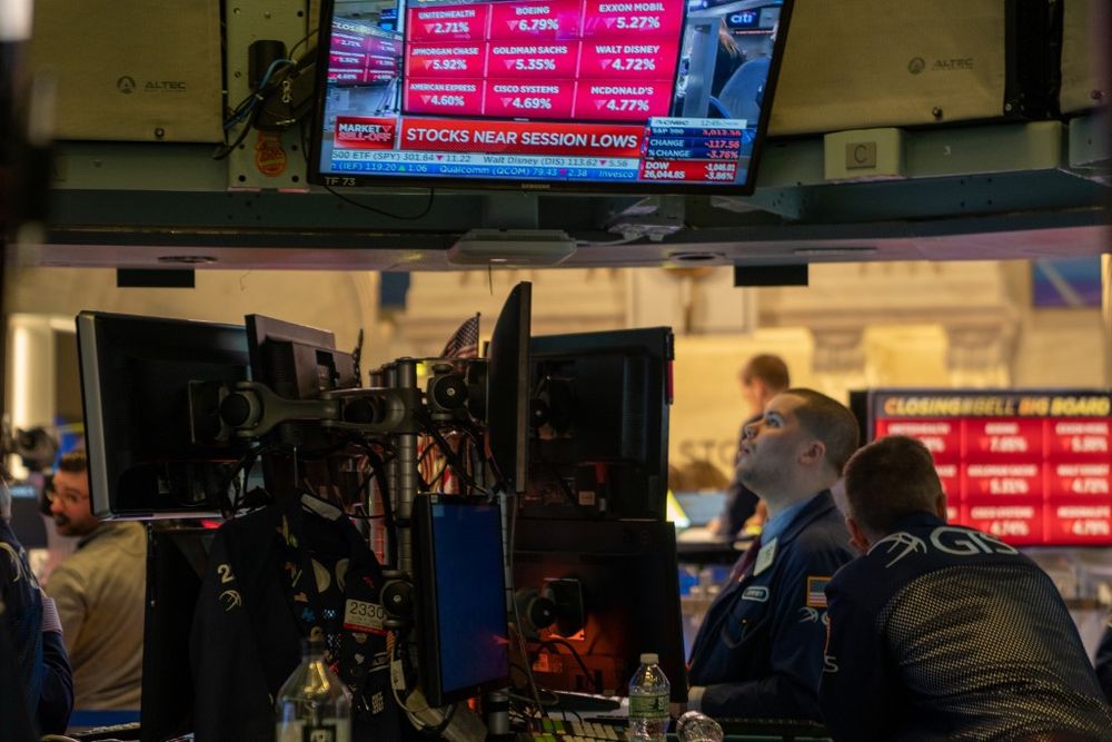 Traders work the floor of the New York Stock Exchange (NYSE) on March 5, 2020 in New York City. Coronavirus fears have whipsawed markets recently, with the Dow Jones Industrial Average ending down more than 950 points, or nearly 3.6 percent. u00e2u20acu201d AFP pic