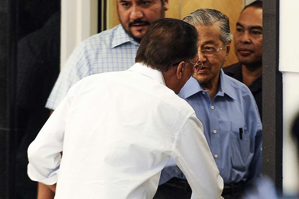 PKR president Datuk Seri Anwar Ibrahim and former prime minister Tun Dr Mahathir Mohammad during a press conference in Yayasan Al-Bukhary in Kuala Lumpur March 1, 2020. — Picture by Miera Zulyana