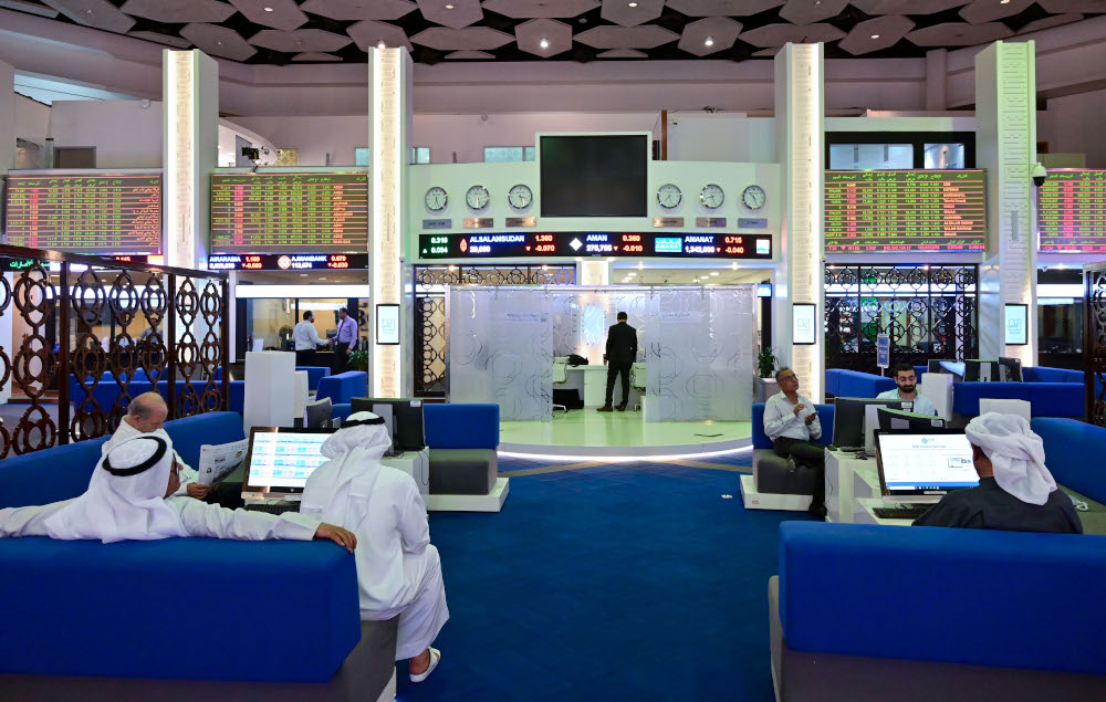 Traders follow financial markets at the Dubai Stock Exchange in the United Arab Emirates, March 8, 2020. u00e2u20acu201d AFP pic 
