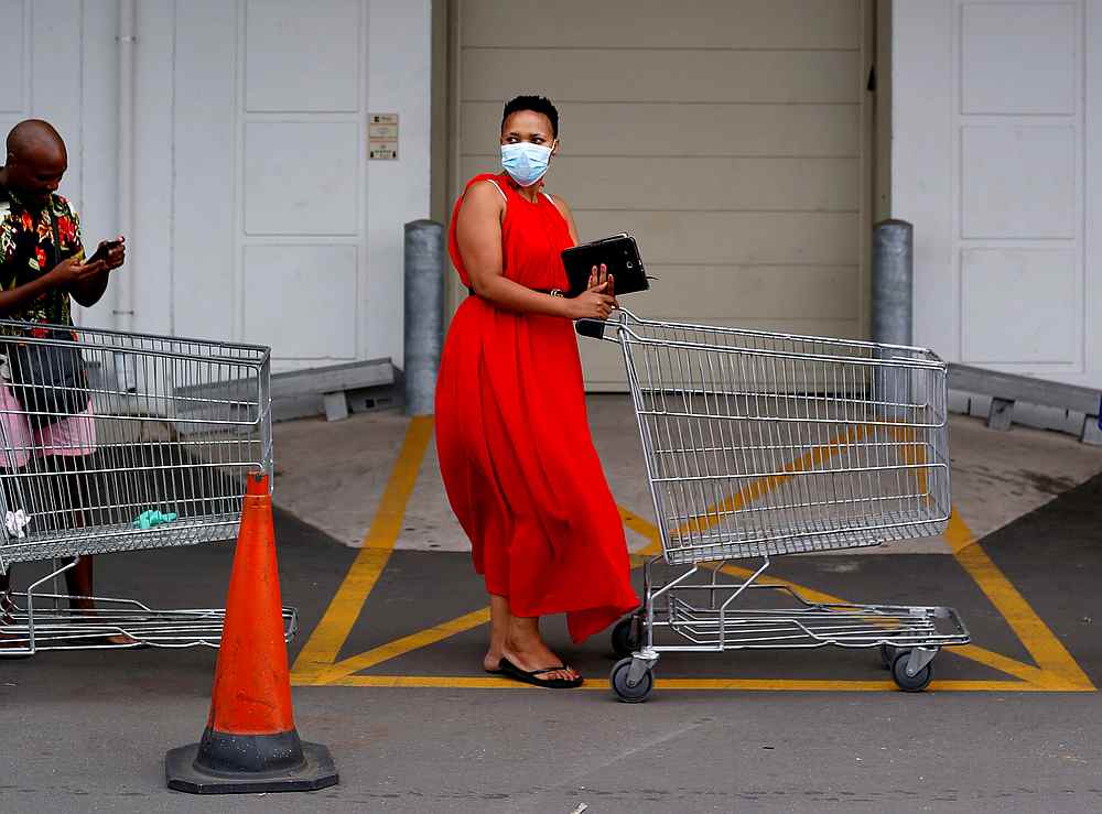 Shoppers queue to stock up on groceries at a Makro store ahead of a nationwide 21-day Covid-19 lockdown in Durban, South Africa March 26, 2020. u00e2u20acu201d Reuters pic