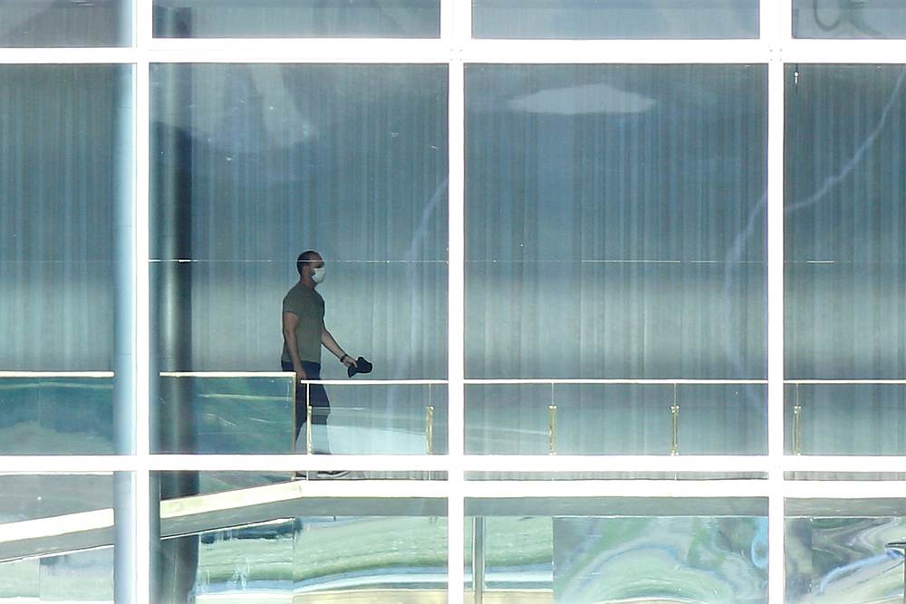 Eduardo Bolsonaro wears a protective face mask at the Alvorada Palace, after reports of the coronavirus in Brasilia, Brazil March 12, 2020. u00e2u20acu201d Reuters