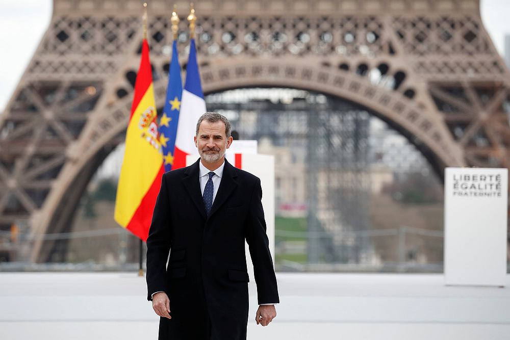 Spain's King Felipe VI walks as the Eiffel Tower is seen in the background during a ceremony to honour victims of terror attacks in Europe at the Trocadero in Paris, France March 11, 2020. u00e2u20acu201d Reuters pic