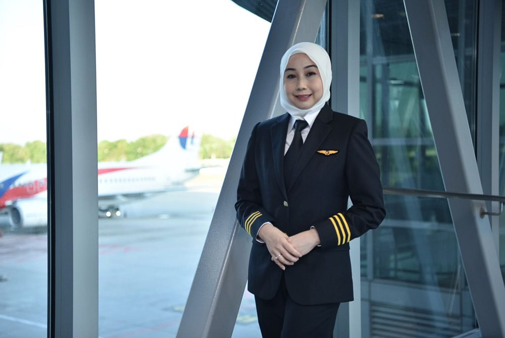 Munirah said people often react with surprise when they meet her as it’s not every day that people get to see a female pilot walking through the airport. — Picture courtesy of Malaysia Airlines