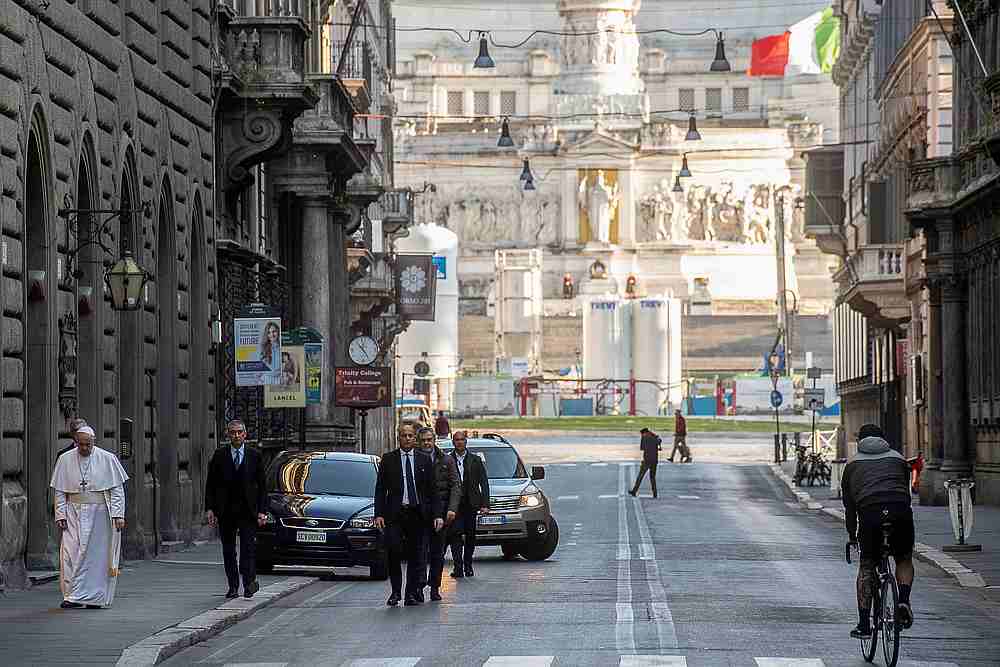 Pope Francis walks in a deserted Rome to pray at two shrines for the end of the coronavirus pandemic, in Rome, Italy March 15, 2020. u00e2u20acu201d Vatican Media handout via Reuters 