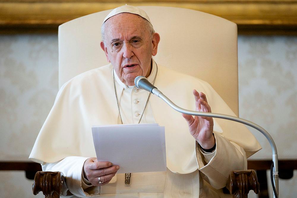 Pope Francis speaks during his general audience as it is streamed via video over the internet from a library inside the Vatican, March 18, 2020. u00e2u20acu201d Vatican Media handout via Reuters