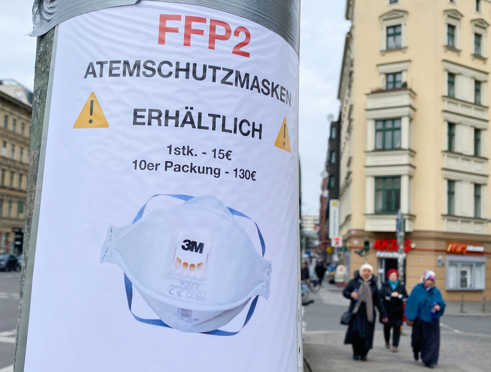 A sign advertising the sale of FFP2 protective face masks is taped to a lamppost in Berlin March 4, 2020. u00e2u20acu201d AFP picn