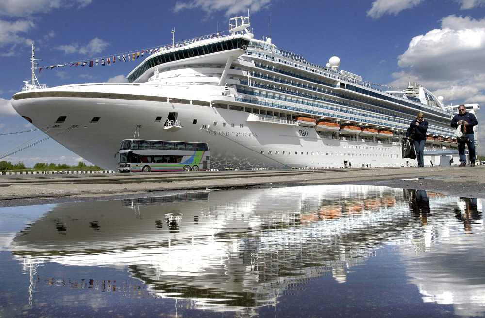 (FILES) In this file photo one of the biggest world cruise liners in the world, P&O's u00e2u20acu02dcGrand Princessu00e2u20acu2122 stays on dock in St Petersburg port, 24 May 2004. u00e2u20acu201d AFP pic 