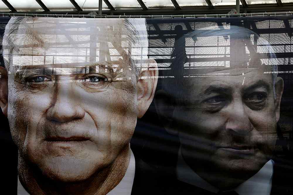 A banner depicts Benny Gantz (left), leader of Blue and White party, and Israel Prime minister Benjamin Netanyahu, in Tel Aviv, Israel February 17, 2020. u00e2u20acu201d Reuters pic