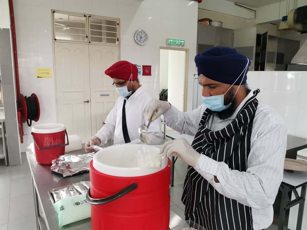 A lunch meal of chapati, rice, a vegetable dish and dhal are prepared at 10am in the morning at the gurdwara itself. — Picture by Amanjeet Singh