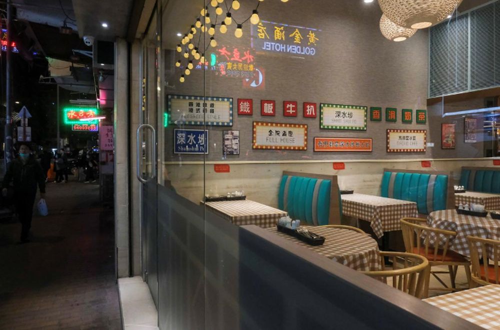 A man walks past near an empty restaurant following the outbreak of the new coronavirus, in Hong Kong, China February 17, 2020. u00e2u20acu201d Reuters pic