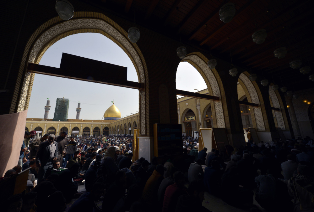 Shiite Muslim Iraqis attend the Friday noon prayer at the main mosque in the shrine city of Kufa, near Najaf in central Iraq March 6, 2020. u00e2u20acu201d AFP pic