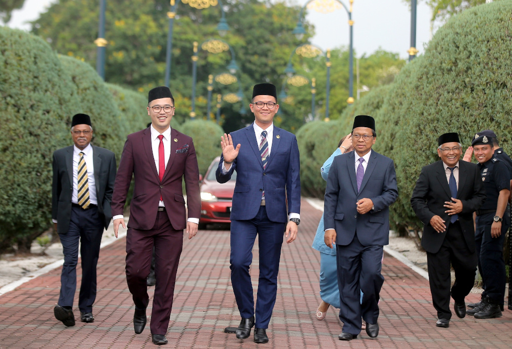 Former state executive committee members walking out of Istana Kinta after an audience with the Sultan of Perak, Sultan Nazrin Muizzuddin Shah. u00e2u20acu201d Picture by Farhan Najib 