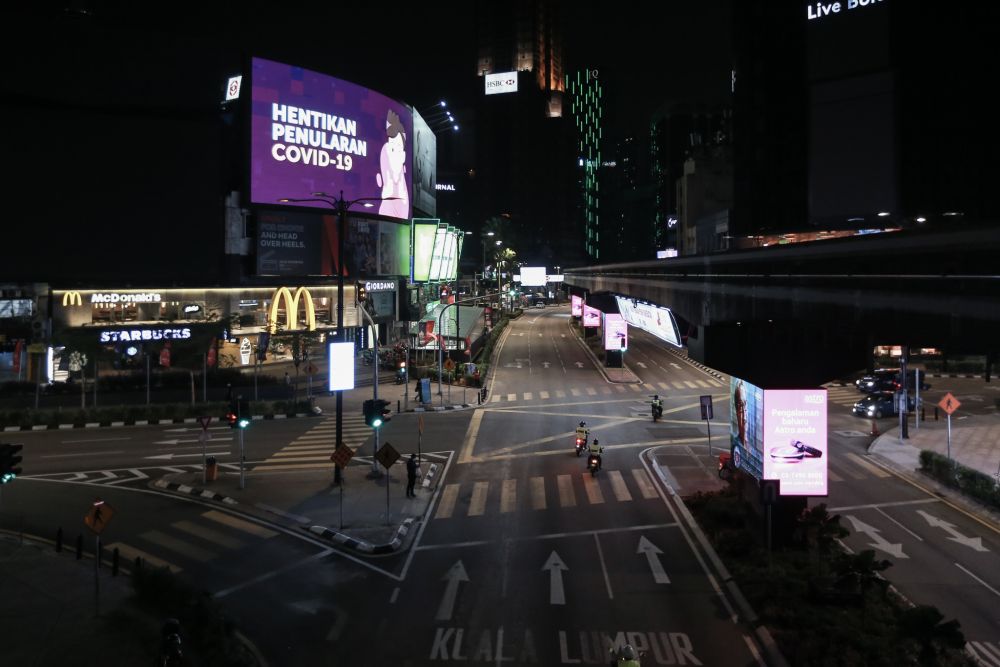 A near-deserted Bukit Bintang is pictured on day seven of the movement control order in Kuala Lumpur March 24, 2020. u00e2u20acu201d Picture by Ahmad Zamzahuri