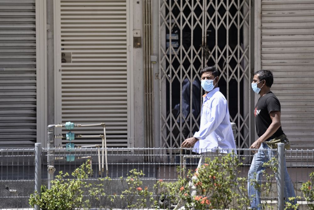 Foreign workers are seen up and about in Kuala Lumpur on day seven of the movement control order March 24, 2020. u00e2u20acu201d Picture by Miera Zulyana
