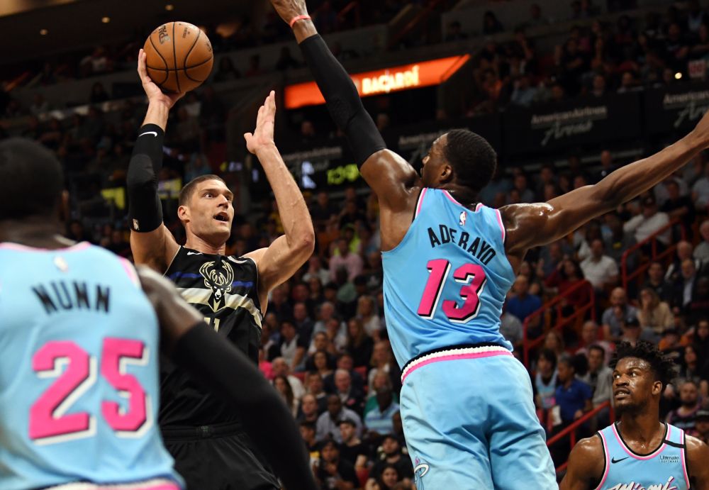 Milwaukee Bucks centre Brook Lopez (11) takes a shot over Miami Heat forward Bam Adebayo (13) in the second quarter at American Airlines Arena. u00e2u20acu201d Reuters pic