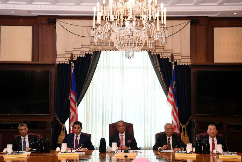 Prime Minister Tan Sri Muhyiddin Yassin chairs the first new Cabinet meeting at the Perdana Putra in Putrajaya March 11, 2020. u00e2u20acu201d Bernama pic