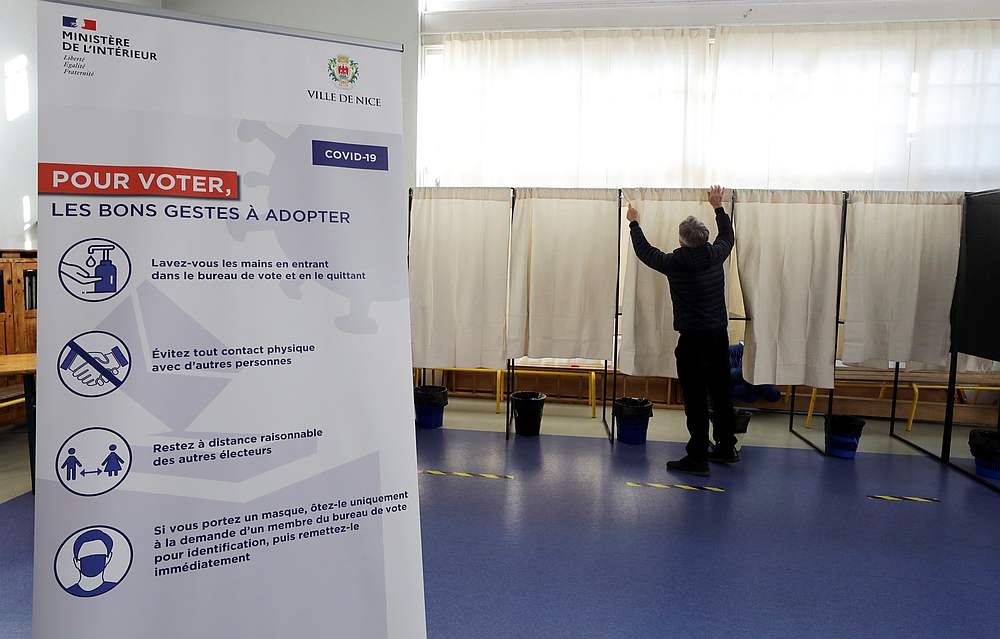 An information board for voters is displayed in a polling station on the eve of the first round of mayoral elections, in Nice, France March 14, 2020. u00e2u20acu201d Reuters pic