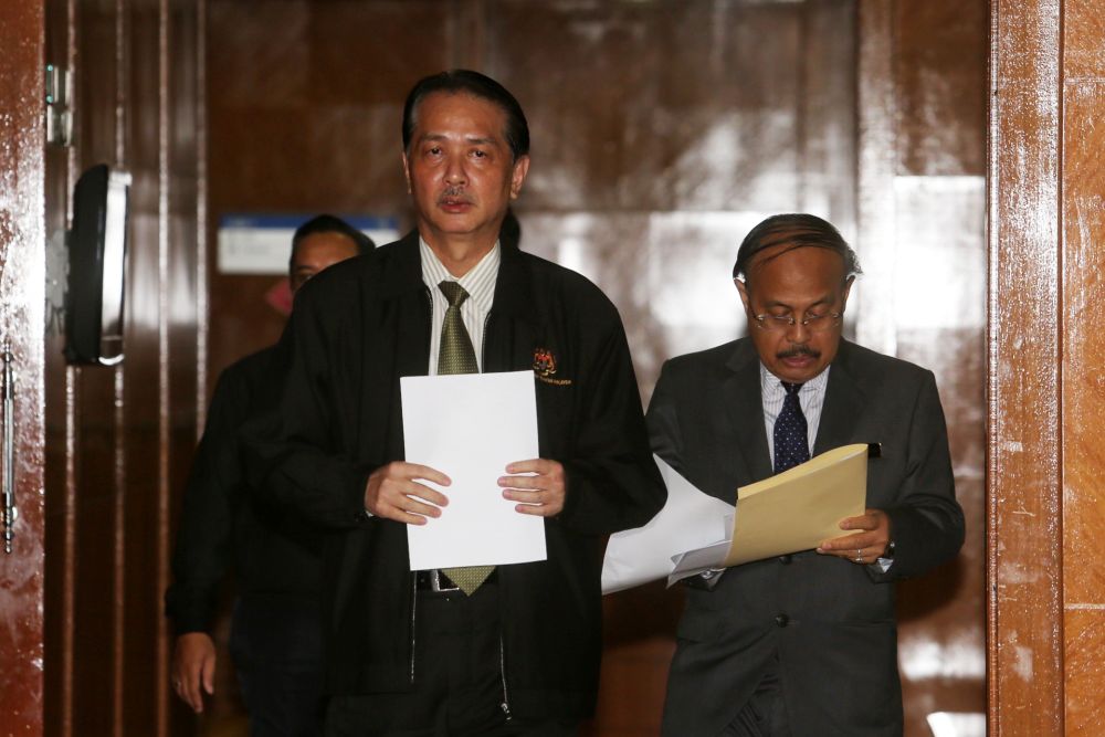 Health Director-General Datuk Dr Noor Hisham Abdullah (left) arrives for a press conference in Putrajaya March 27, 2020. u00e2u20acu201d Picture by Choo Choy May