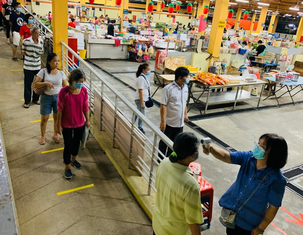 Each person is scanned before entering the Juru market in Penang March 20, 2020. u00e2u20acu201d Picture courtesy of Gooi Hsiao Leung