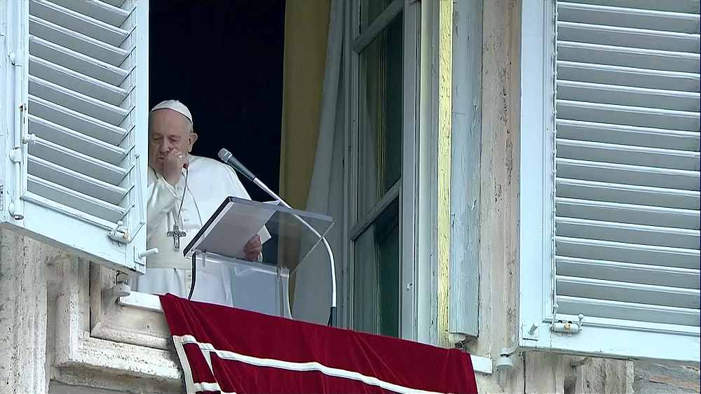 Pope Francis coughs as he leads the weekly Angelus prayer in St Peter's Square at the Vatican, March 1, 2020. u00e2u20acu201d Vatican Media handout via Reuters 