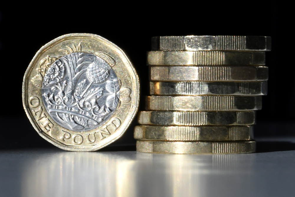 In this file photo taken on October 05, 2017 British one pound sterling coins are arranged for a photograph in central London. u00e2u20acu201d AFP pic 