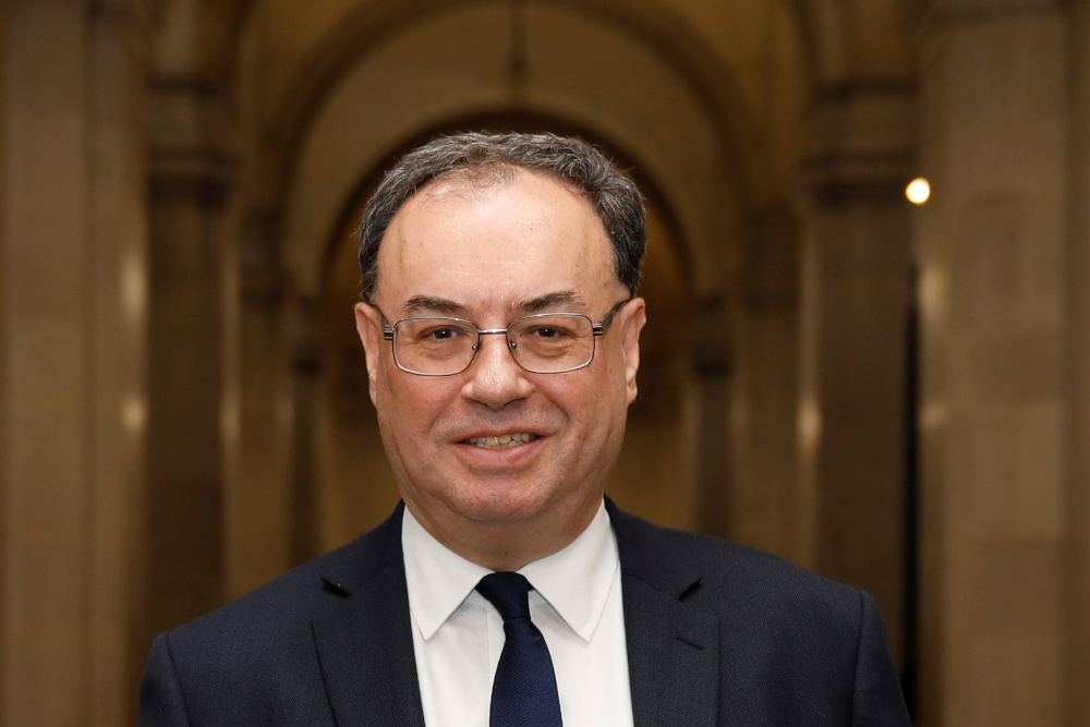 Bank of England Governor Andrew Bailey poses for a photograph on the first day of his new role at the Central Bank in London March 16, 2020. u00e2u20acu201d Picture by Tolga Akmen/Pool via Reuters