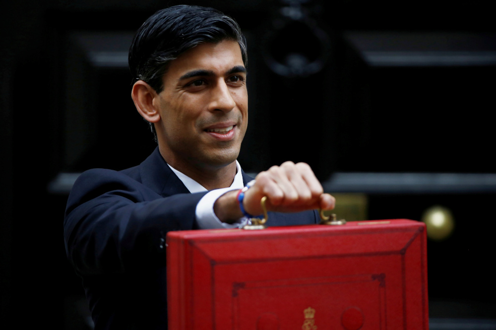 Britain's Chancellor of the Exchequer Rishi Sunak poses with the red budget box outside his office in Downing Street in London March 11, 2020. u00e2u20acu201d Reuters pic