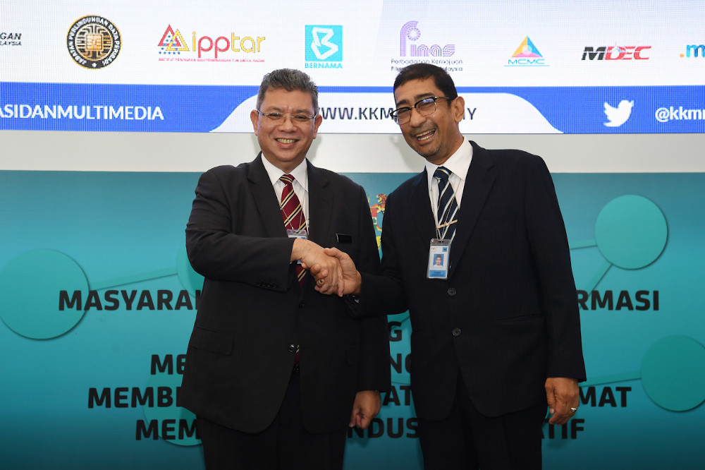 Communications and Multimedia Minister Datuk Saifuddin Abdullah and his deputy Datuk Zahidi Zainul Abidin officially clock in today at the ministry in Putrjaya March 11, 2020. u00e2u20acu201d Bernama pic 