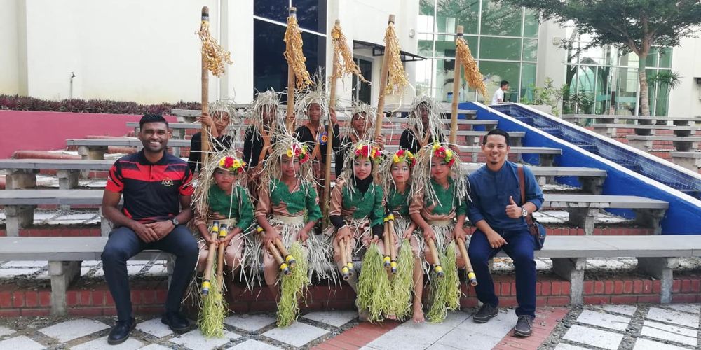 Samuel Isaiah (left) taught his student to love, embrace and use technology and experience English language learning on par with urban schools. u00e2u20acu201d Picture via Facebook