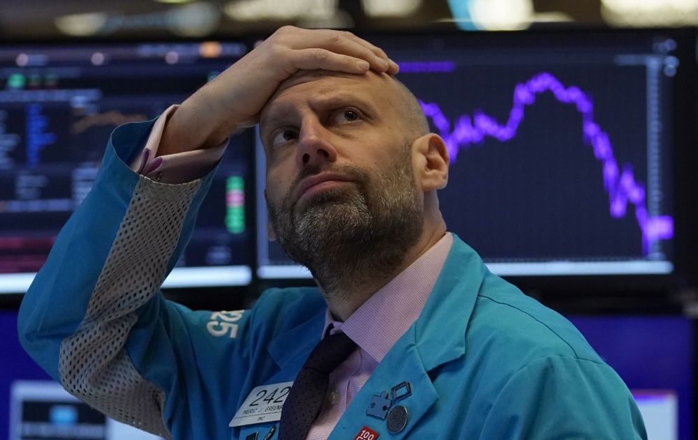 Meric Greenbaum, Designated Market Maker IMC financial looks up at the board before the opening bell right before trading halted on the New York Stock Exchange on March 9, 2020 in New York. u00e2u20acu201d AFP pic