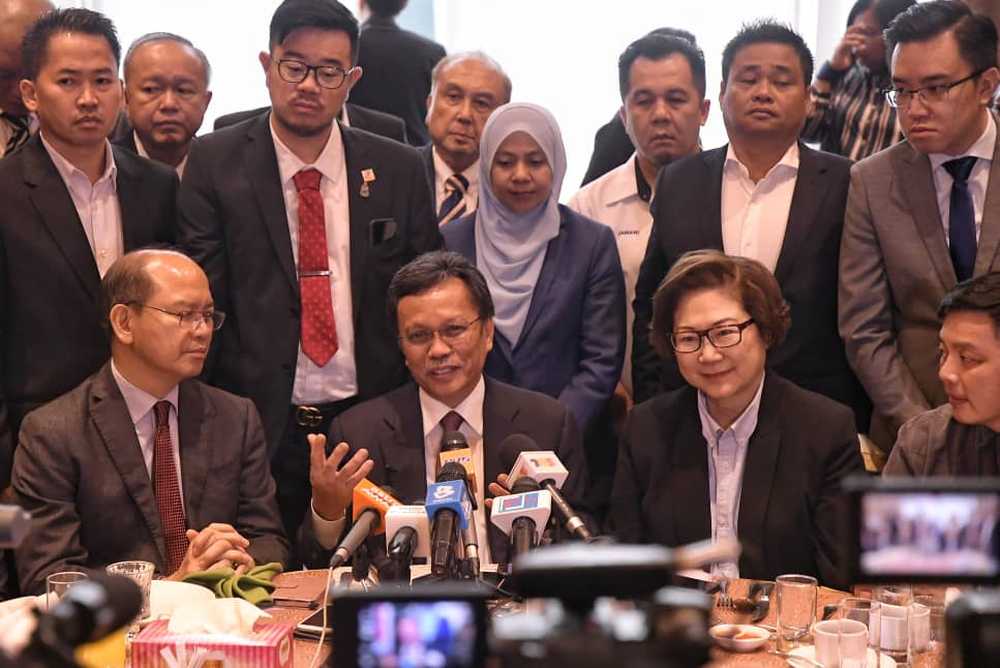 Sabah Chief Minister Datuk Seri Shafie Apdal (centre) said that the state government would work with Putrajaya in the interests of the people but that it would not be politically affiliated. u00e2u20acu2022 Picture by Julia Chan