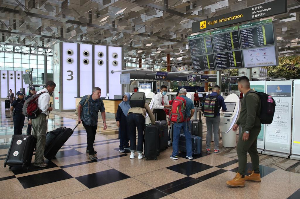 All travellers who show symptoms of fever or respiratory illness and who thus have to undergo a Covid-19 swab test at Singaporeu00e2u20acu2122s checkpoints will also have to serve a 14-day stay-home notice. u00e2u20acu201d TODAY pic