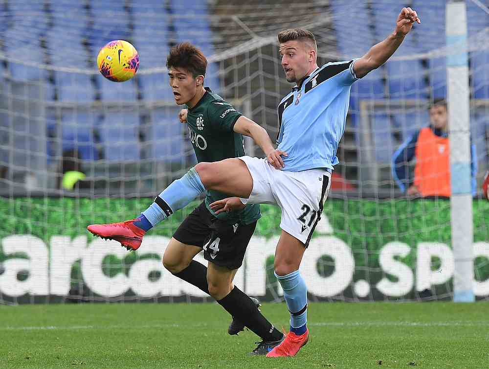 Lazio's Sergej Milinkovic-Savic (right) in action with Bologna's Takehiro Tomiyasu in a Serie A match   at Stadio Olimpico, Rome, Italy February 29, 2020. u00e2u20acu201d Reuters pic