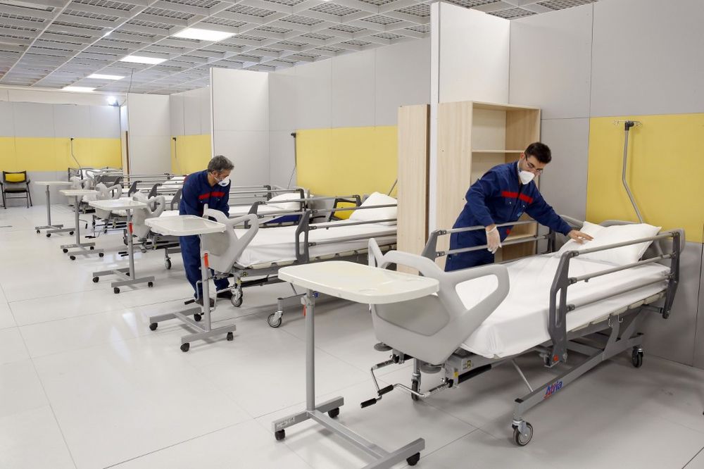 Iranian workers set up a makeshift hospital inside the Iran Mall, northwest of Tehran, on March 21, 2020 amid the coronavirus outbreak. u00e2u20acu201d AFP pic