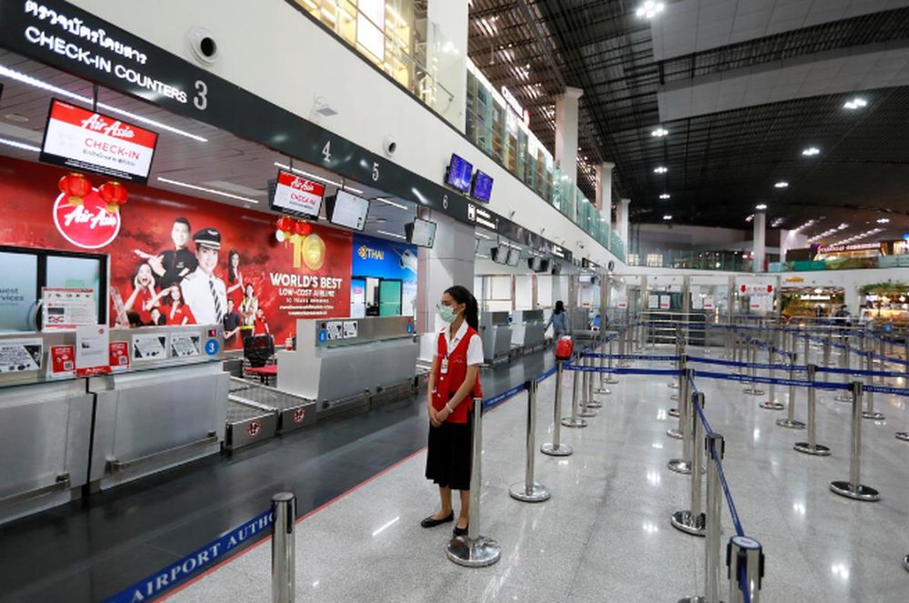 An airline staff member wearing a protective mask stands at U-Tapao Airport, in Rayong, Ban Chang District, Thailand, February 4, 2020. u00e2u20acu201d Reuters pic