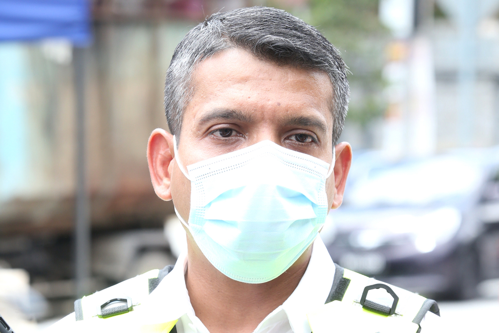 Petaling Jaya police chief Nik Ezanee Mohd Faisal speaks to reporters during a press conference in Petaling Jaya April 12, 2020. u00e2u20acu201d Picture by Miera Zulyana