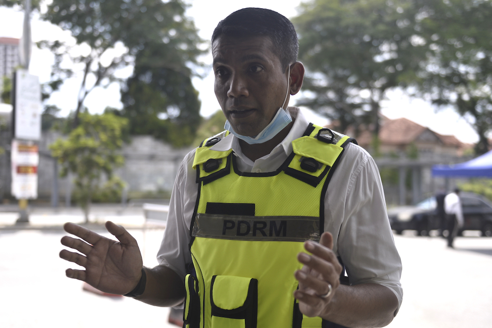 Petaling Jaya police chief Nik Ezanee Mohd Faisal speaks to reporters during a press conference in Petaling Jaya April 12, 2020. u00e2u20acu201d Picture by Miera Zulyana