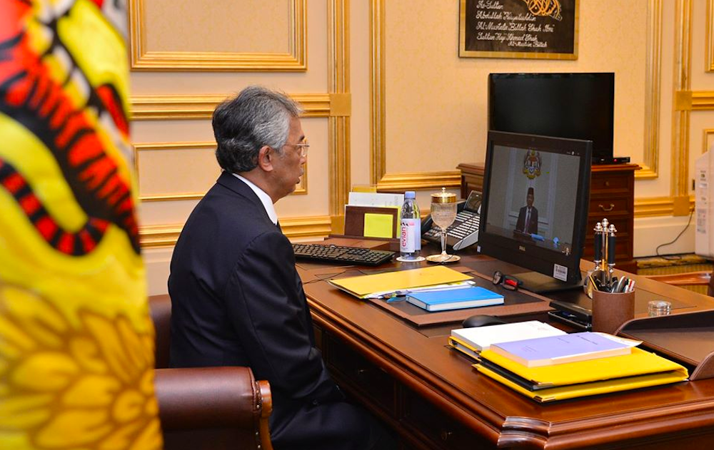 Yang di-Pertuan Agong Al-Sultan Abdullah Ri'ayatuddin Al-Mustafa Billah Shah convening the pre-Cabinet meeting with Prime Minister Tan Sri Muhyiddin Yassin via a video conference. u00e2u20acu201d Picture courtesy of Facebook/Muhyiddin Yassin