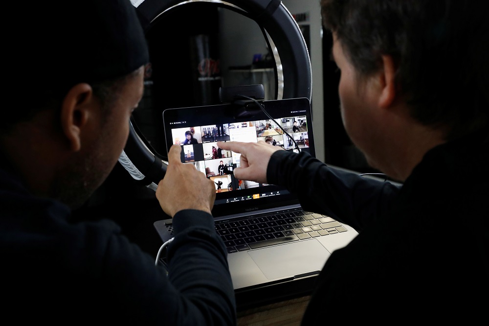 Ku00e2u20acu2122waun Conquest (left) and Parris Bender organise students before a live virtual lesson over Zoom at One Martial Arts in Millbrae, California March 23, 2020. u00e2u20acu201d Reuters pic