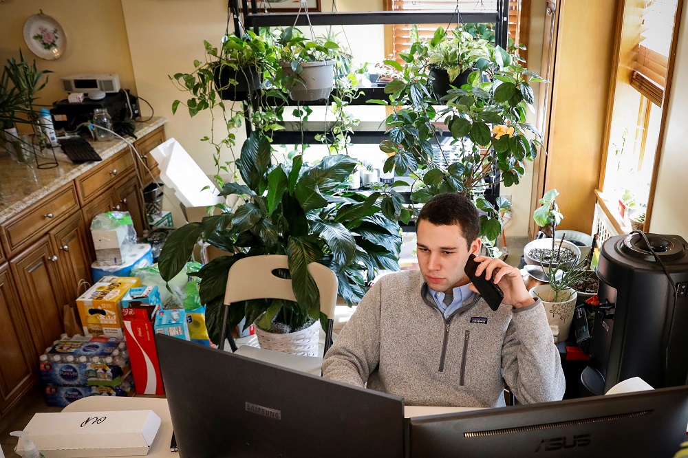 NYSE-AMEX Options floor trader Alex from TradeMas Inc works in an off-site trading office built when the New York Stock Exchange (NYSE) closed, due to the outbreak of the coronavirus disease, in New York March 26, 2020. u00e2u20acu201d Reuters pic 
