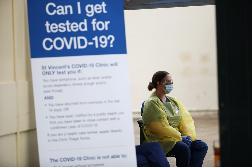 A healthcare professional waits at a pop-up clinic testing for the coronavirus disease  at Bondi Beach in Sydney April 1, 2020. u00e2u20acu201d Reuters pic