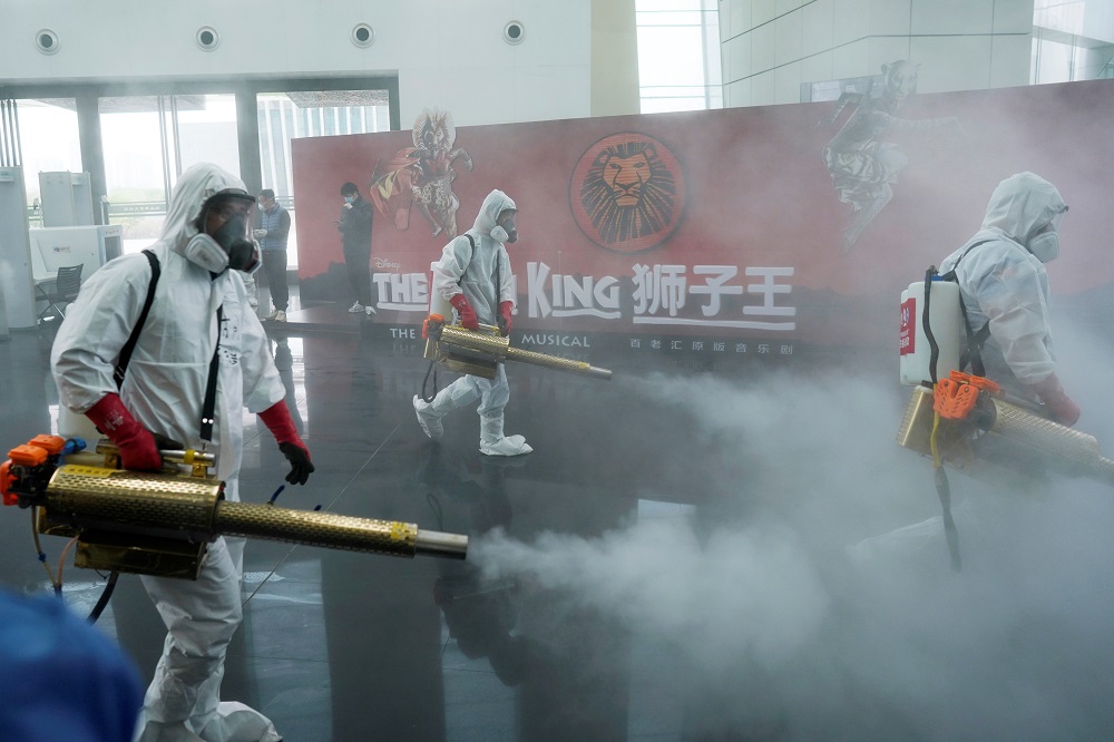 Volunteers from the Blue Sky Rescue team disinfect at the Qintai Grand Theatre in Wuhan April 2, 2020. u00e2u20acu201d Reuters pic