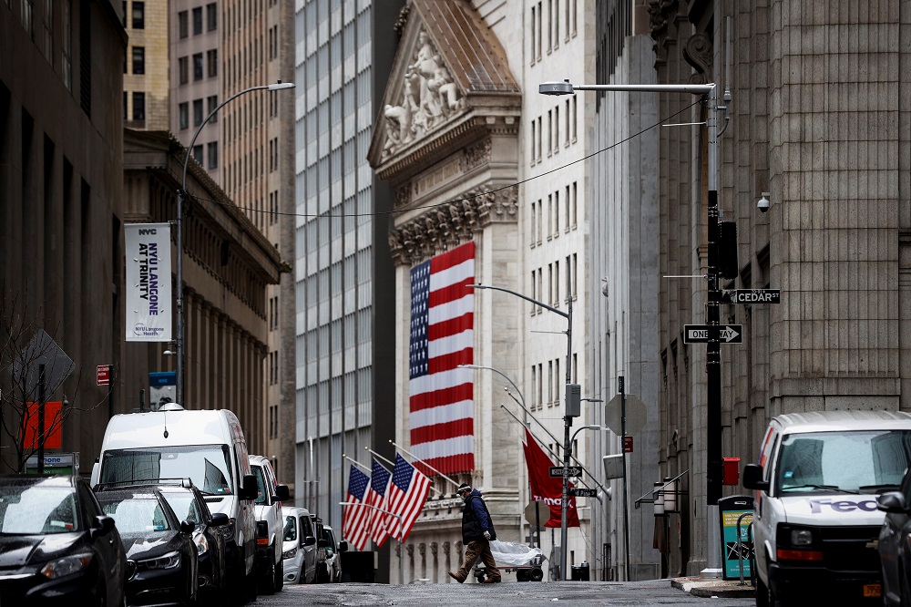 A man crosses a nearly deserted Nassau Street in front of the New York Stock Exchange in the financial district of lower Manhattan, New York April 3, 2020. u00e2u20acu201d Reuters pic