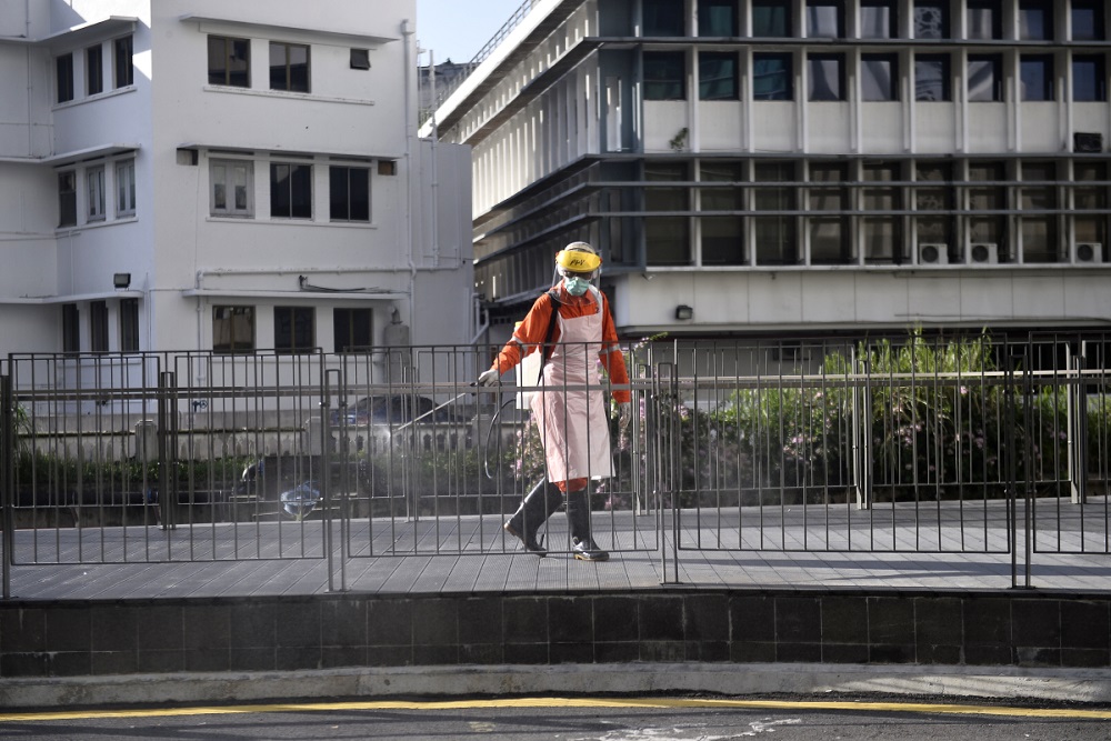 A DBKL worker sprays disinfectant at public spaces near Masjid Jamek in Kuala Lumpur April 8, 2020. u00e2u20acu2022 Picture by Miera Zulyana