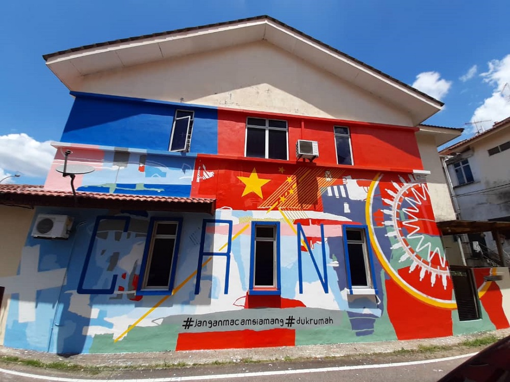 Fakhrul Zaman Mohd Sambas took eight days to complete the Covid-19-themed mural at his home in Bandar Pulai Jaya in Skudai. u00e2u20acu201d Picture courtesy of Fakhrul Zaman